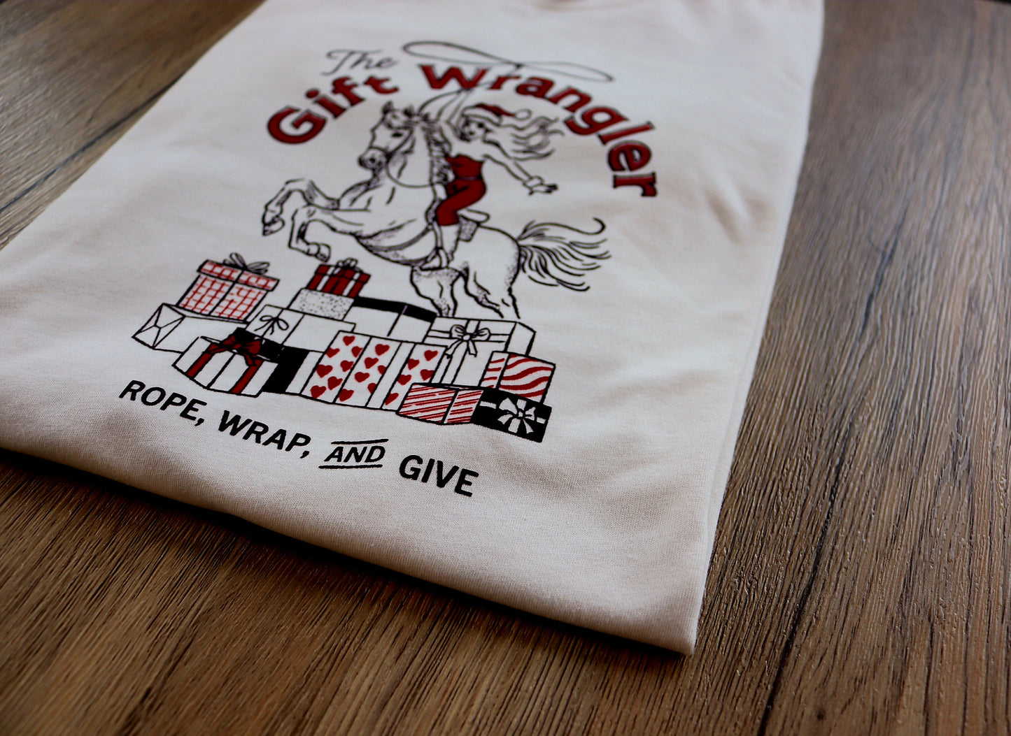 The Gift Wrangler Tee – Holiday Western Graphic T-Shirt